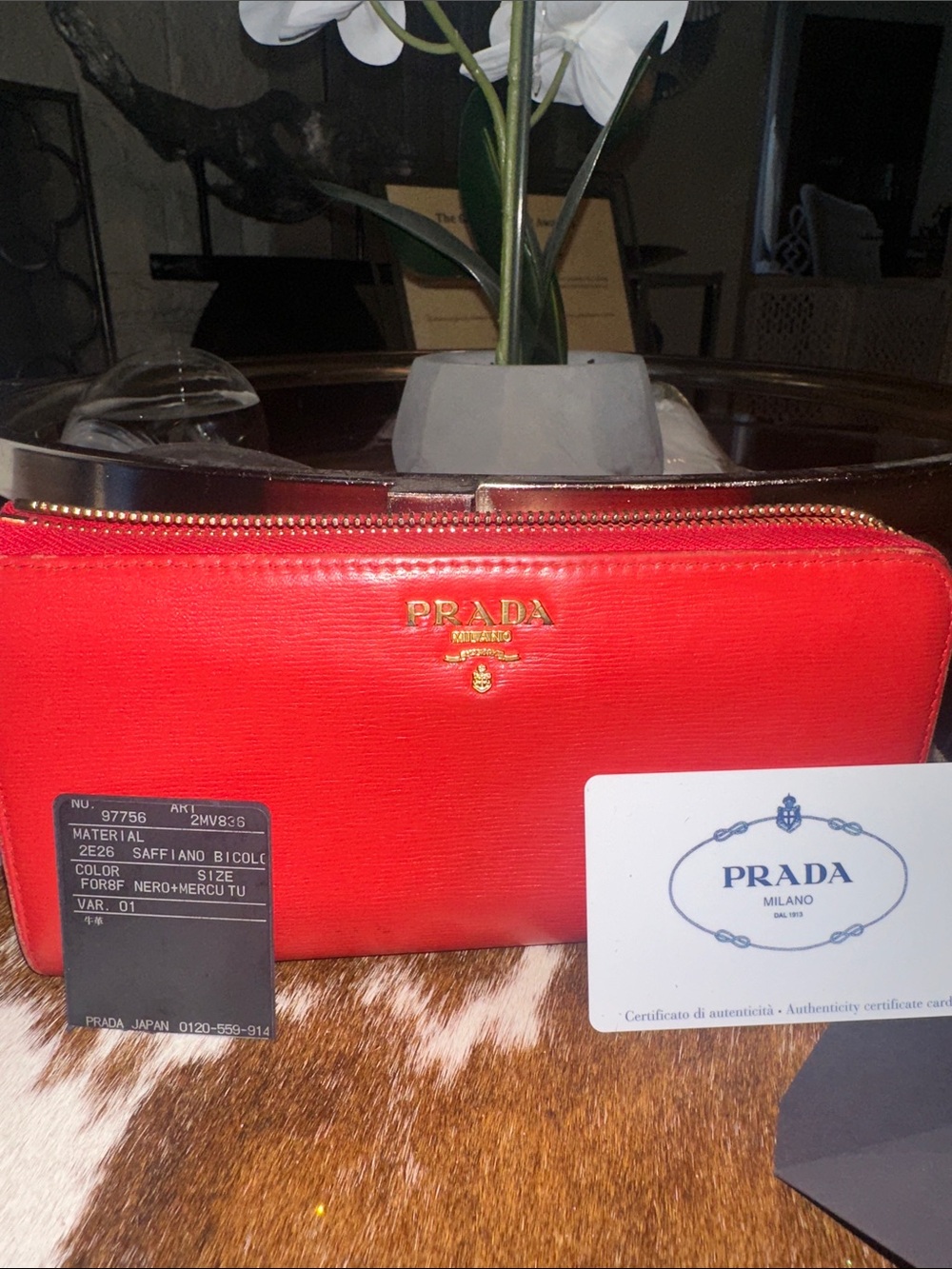 Authentic Prada zip-around continental wallet in Vitello Move leather